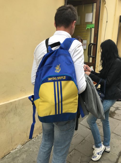 a young man with a backpack